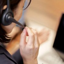 Asian business person responding at the customer center